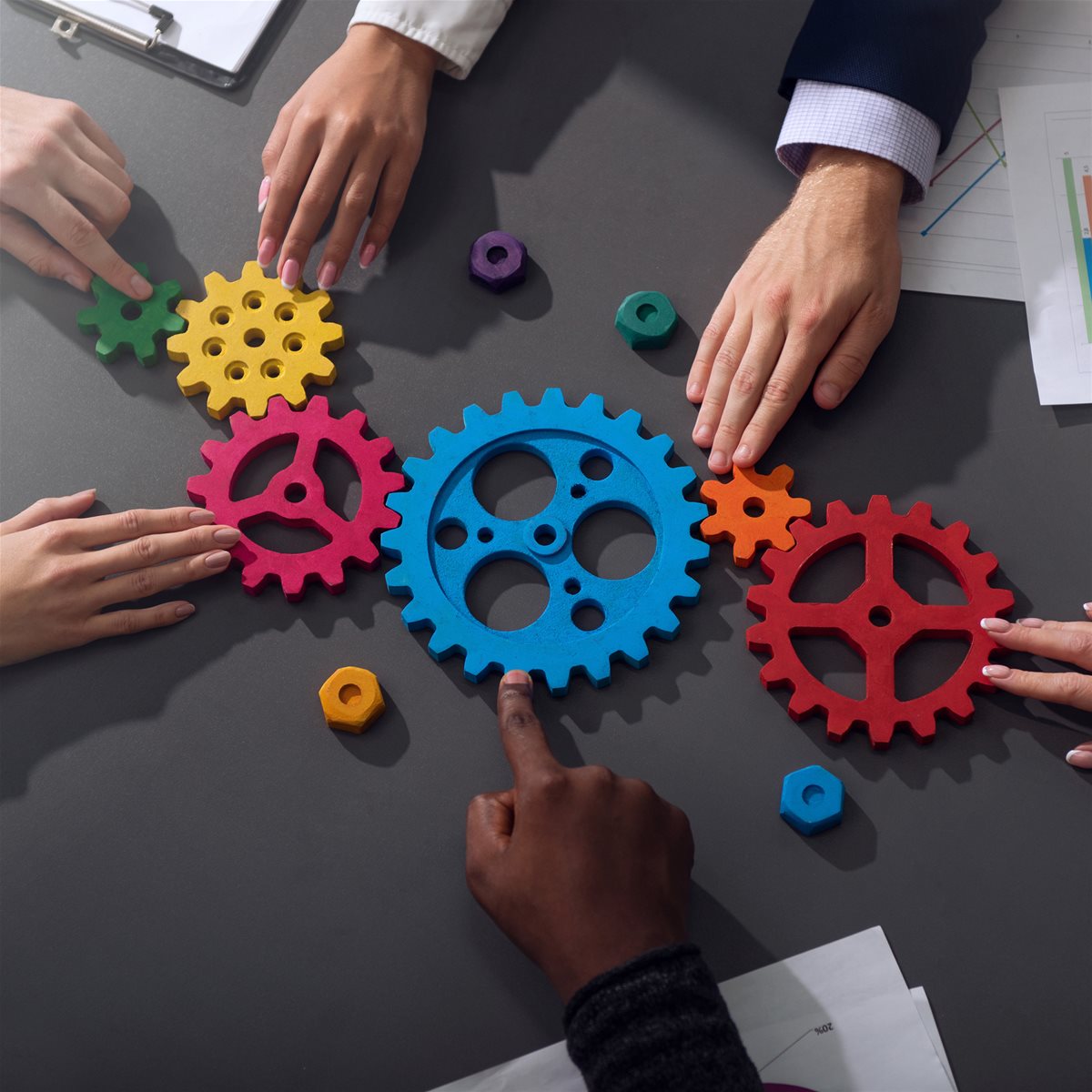 strategic-partnership-hands-gears-istock-1203832818